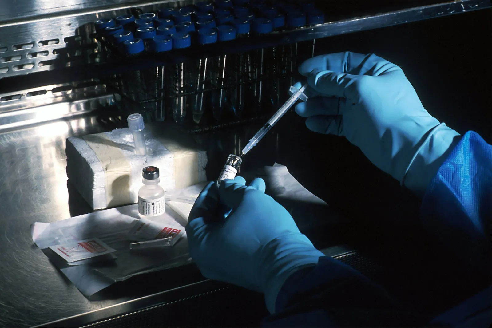 Clinician preparing sterile dressing supplies on a tray